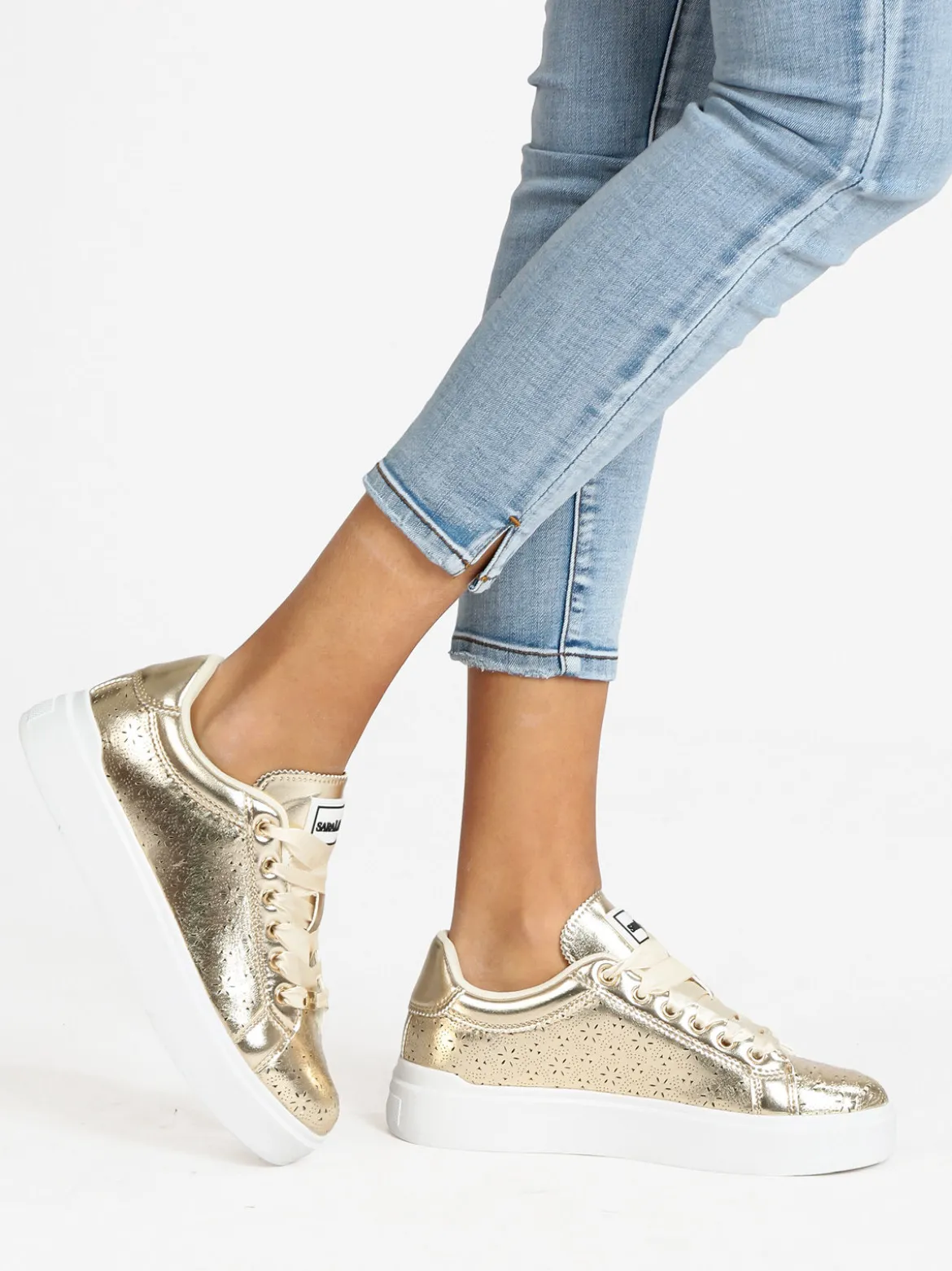 Saralòpez Sneakers traforata da donna con platform
